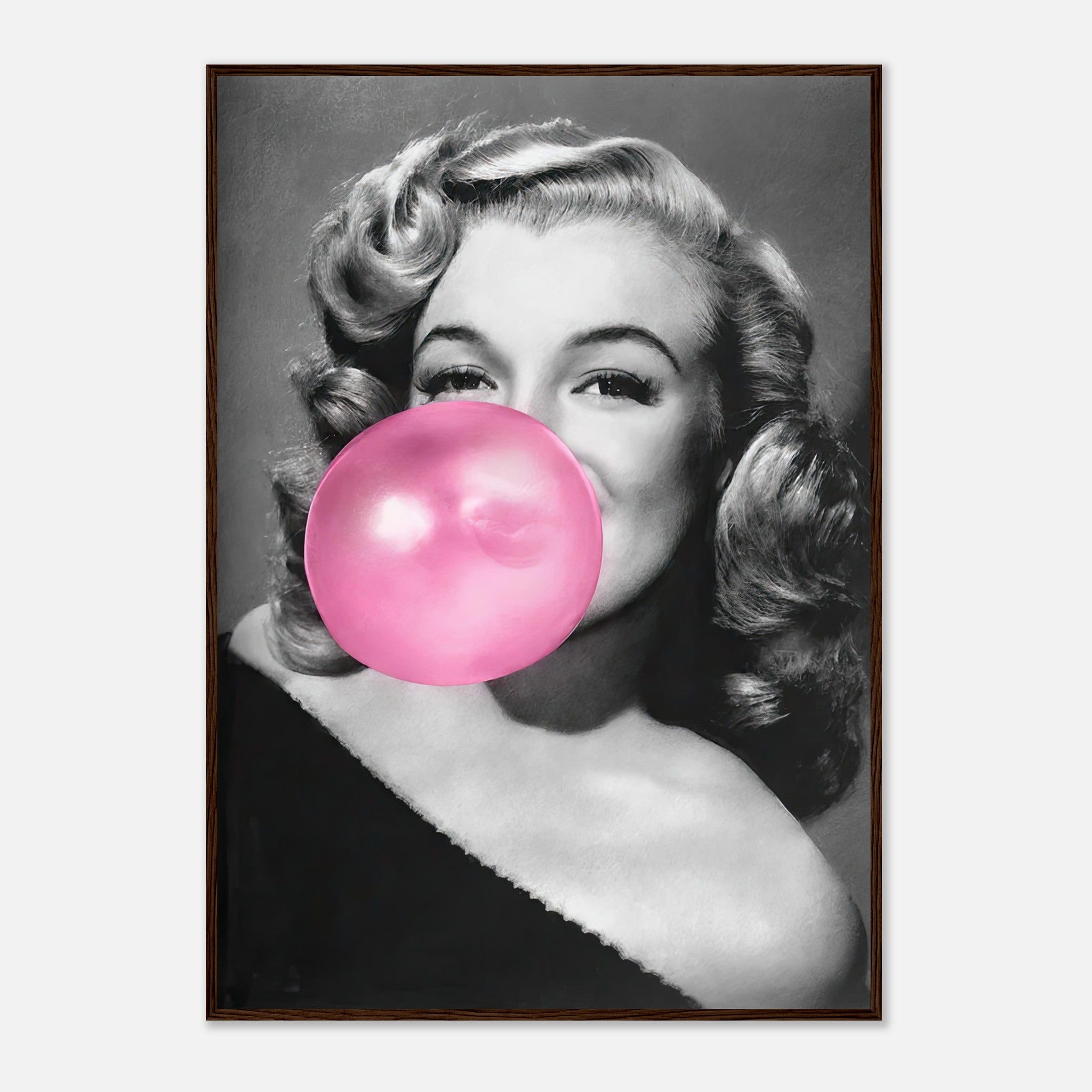 Framed print of Marilyn Monroe blowing pink bubble gum, adding a playful and glamorous touch to your wall décor.