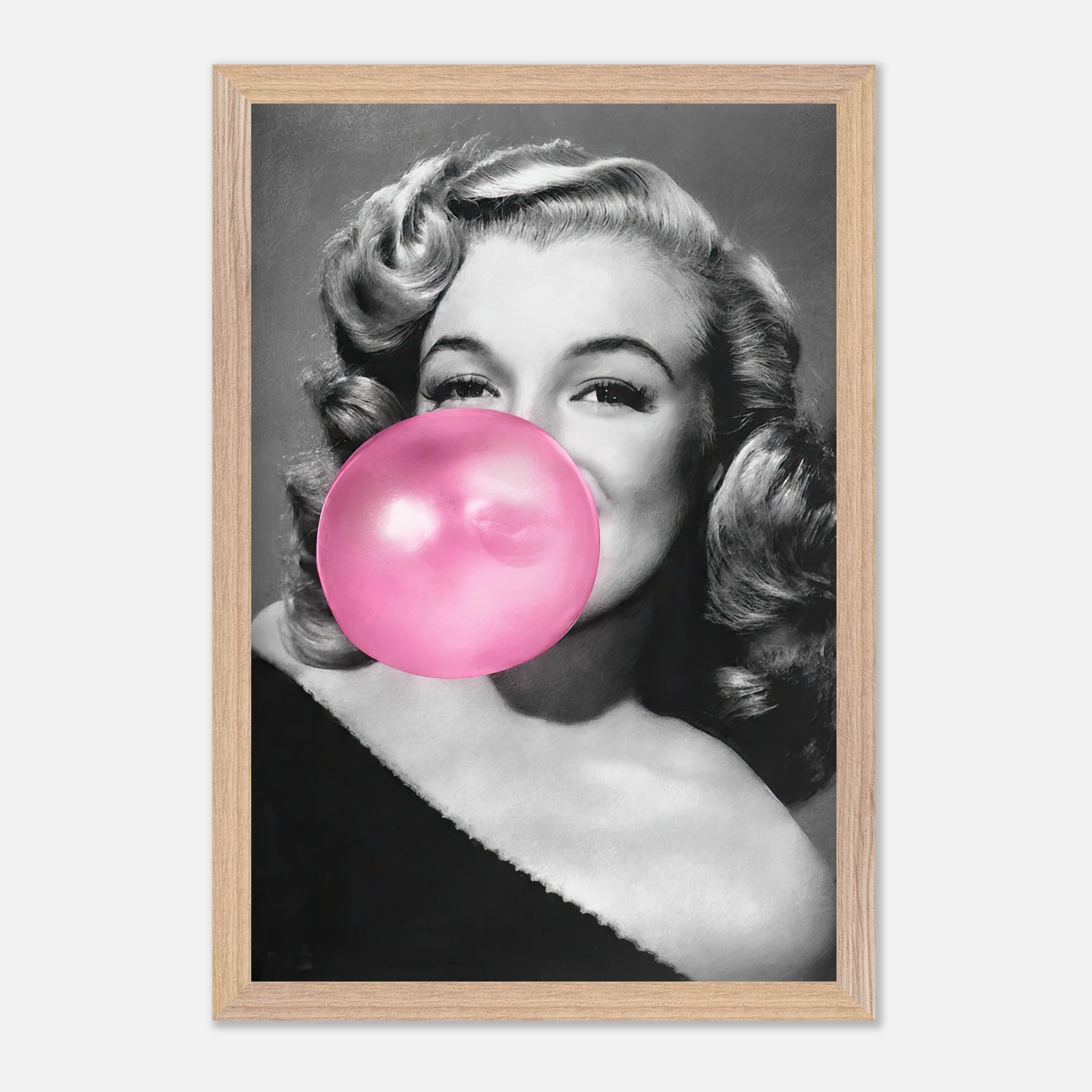 Marilyn Monroe vintage print with pink bubble gum, framed in wood, showcasing a playful and iconic Hollywood moment.