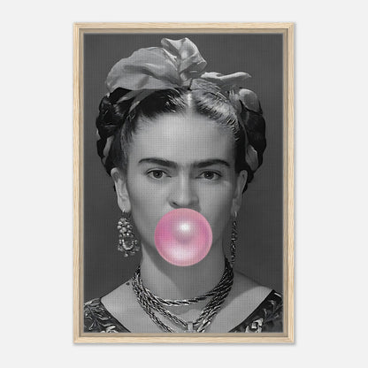 Frida Kahlo Bubble Gum framed canvas print featuring a grayscale portrait with a pink bubble gum bubble.