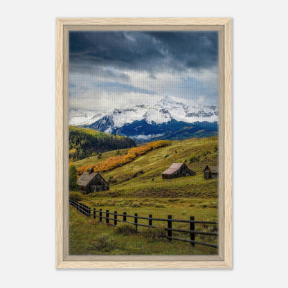 Framed canvas print of Telluride, Colorado featuring snow-capped mountains and rustic barns in a scenic valley.