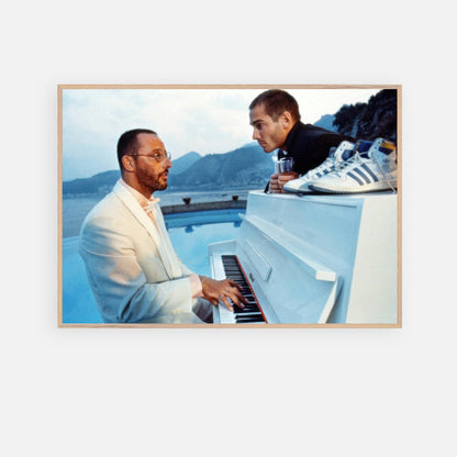 Jean Reno Piano fine art print featuring a piano performance by two men with a coastal backdrop from *The Big Blue*.