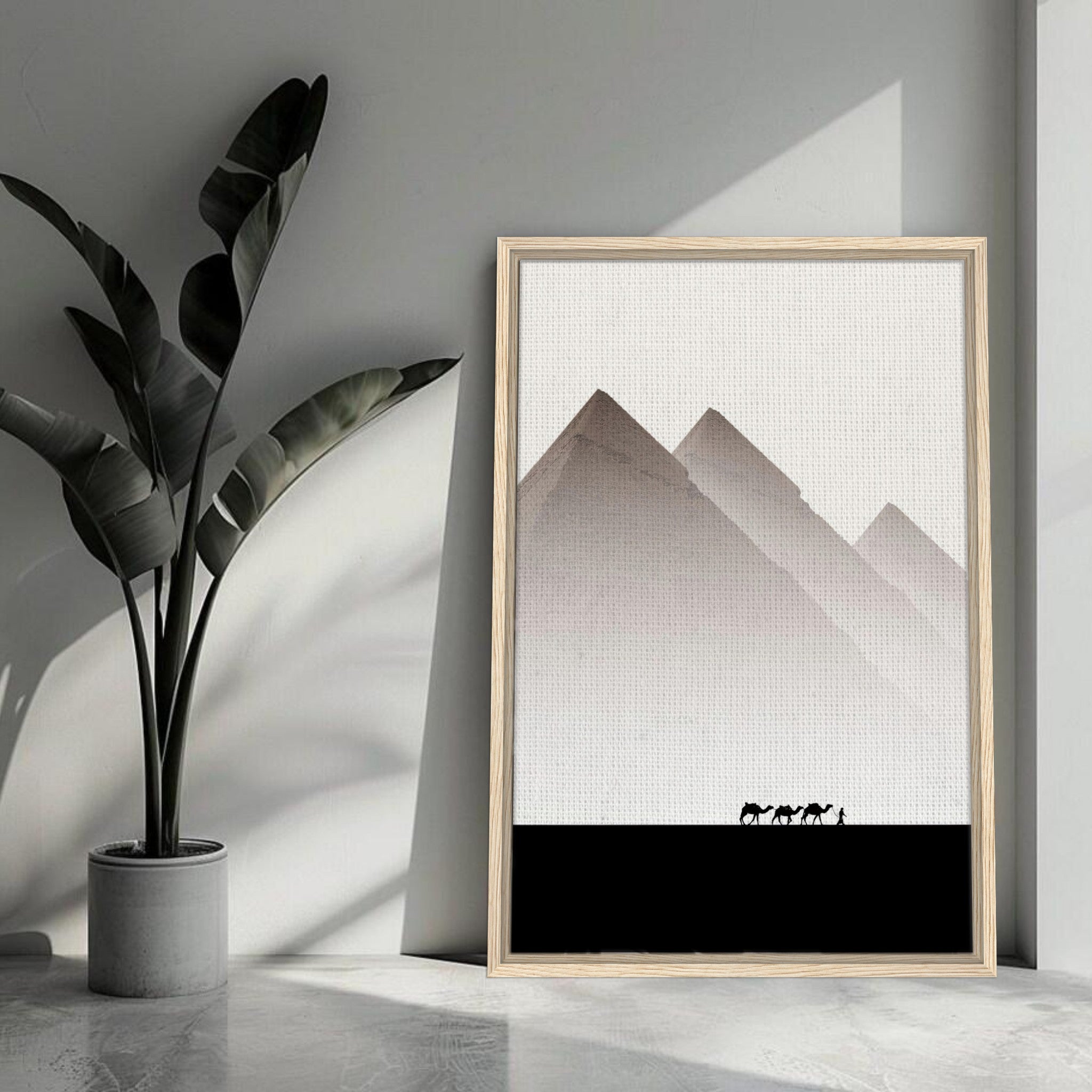 Pyramids of Giza framed canvas print featuring minimalist design with earthy tones and silhouettes of camels.