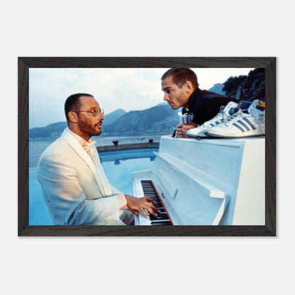 Jean Reno piano performance scene at poolside with coastal backdrop, capturing cinematic elegance and nostalgia.