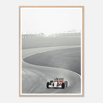 Framed giclée fine art of Ayrton Senna in McLaren MP4/4 racing on a curved track from 1988 Formula 1 season.