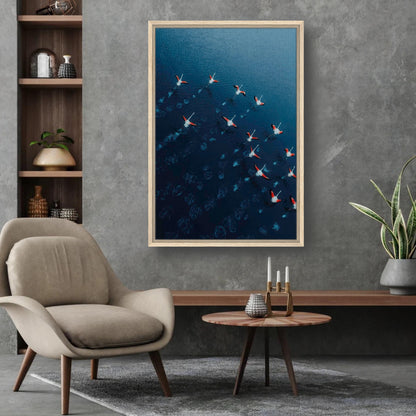 Flamingos drone photography framed canvas print in a modern living room with neutral decor and greenery.