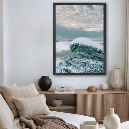Big wave surfing fine art print displayed in a modern living room, showcasing ocean's power and beauty.