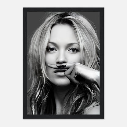 Kate Moss Mustache Framed Print featuring a stylish black-and-white portrait with a playful mustache design.