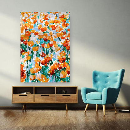 Abstract floral tulip garden print in vibrant orange and red hues on brushed metal, displayed in a modern living room.