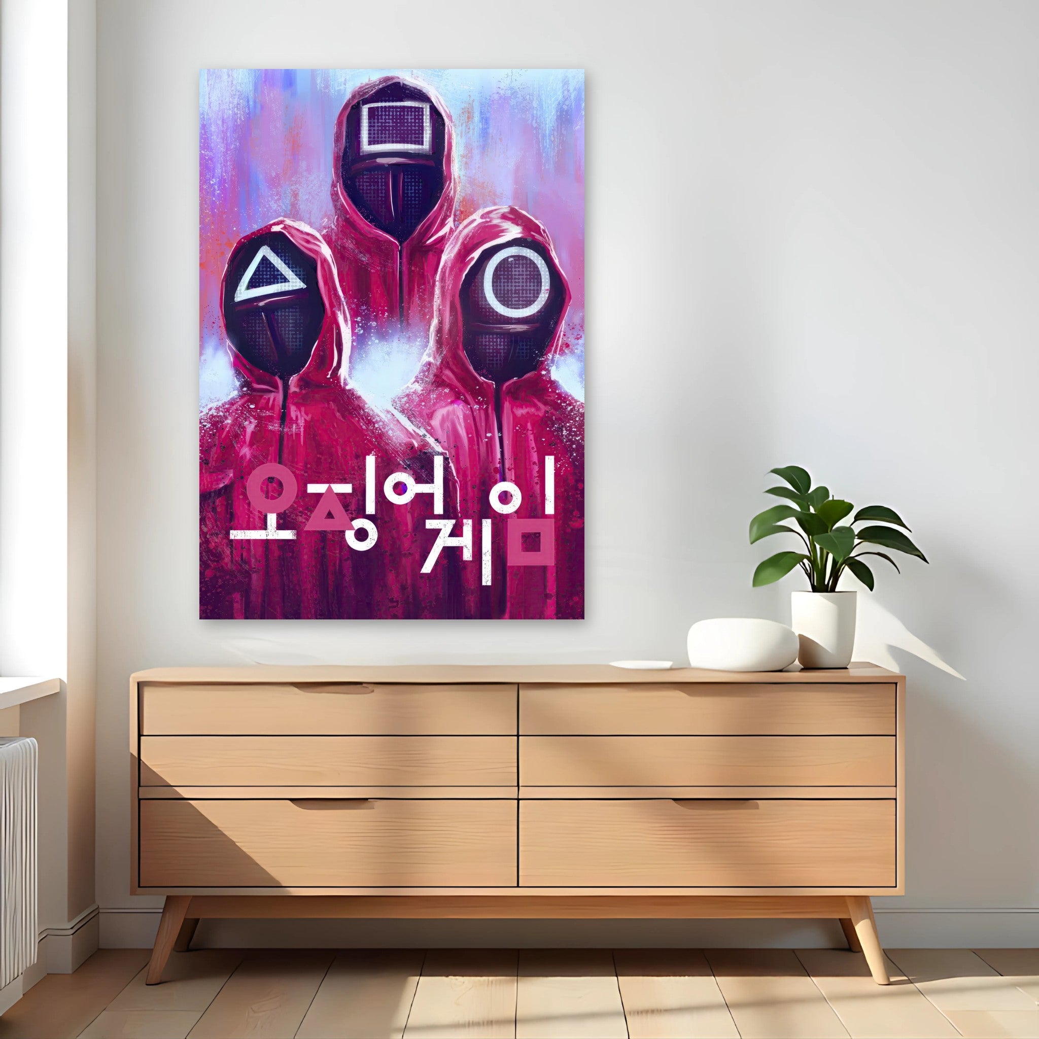 Squid Game poster featuring iconic guards in red suits with geometric masks and bold Korean text, enhancing any room's decor.