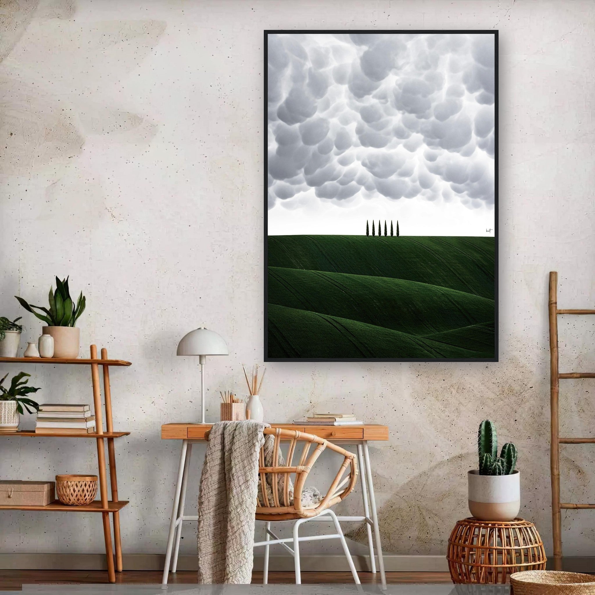 Framed print of Tuscany with rolling green hills and cypress trees, showcased in a modern interior setting.