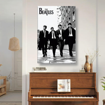 The Beatles canvas print featuring the iconic band walking in suits, perfect for home decor.
