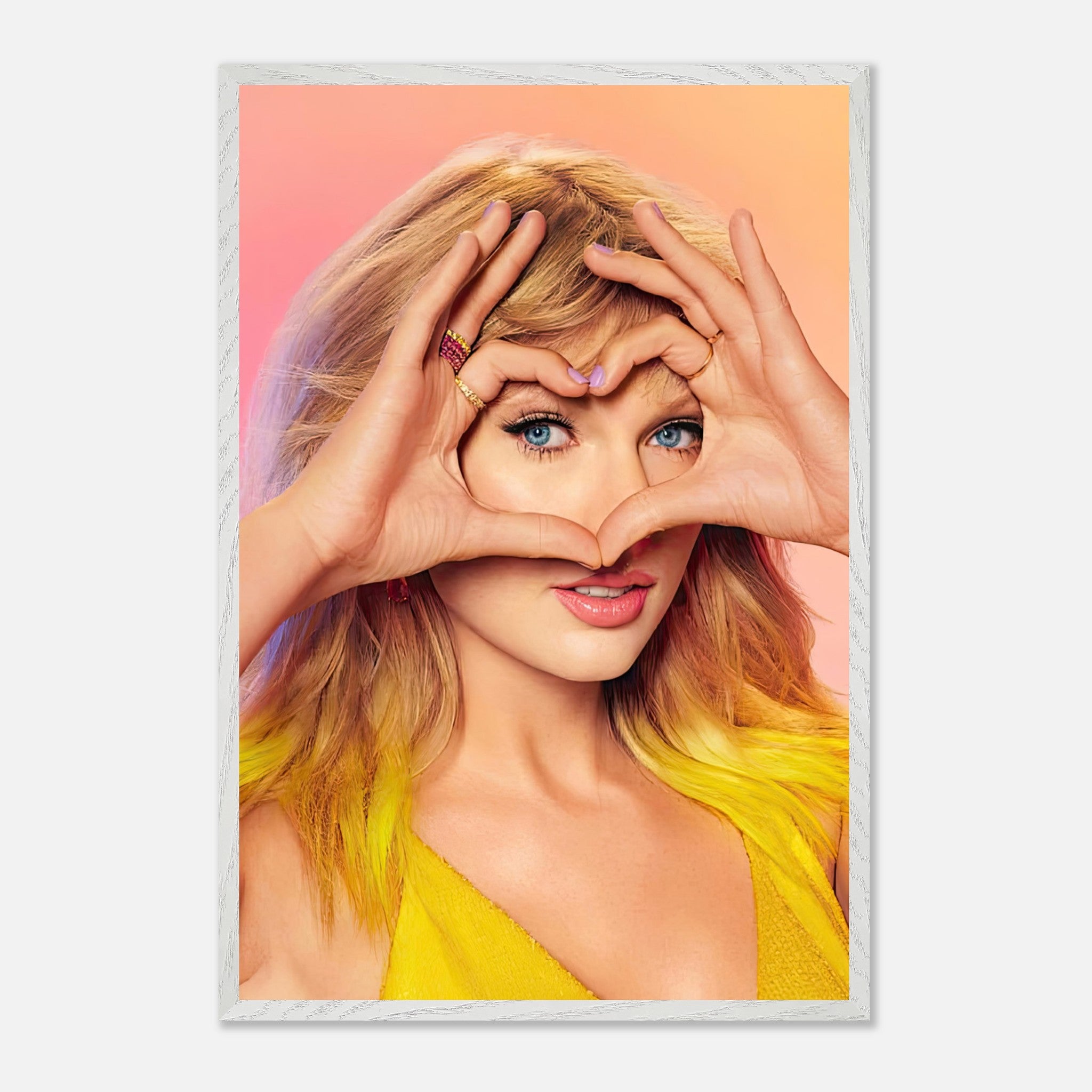 Taylor Swift forming a heart shape with her hands, showcasing vibrant colors in a vintage-inspired framed print.