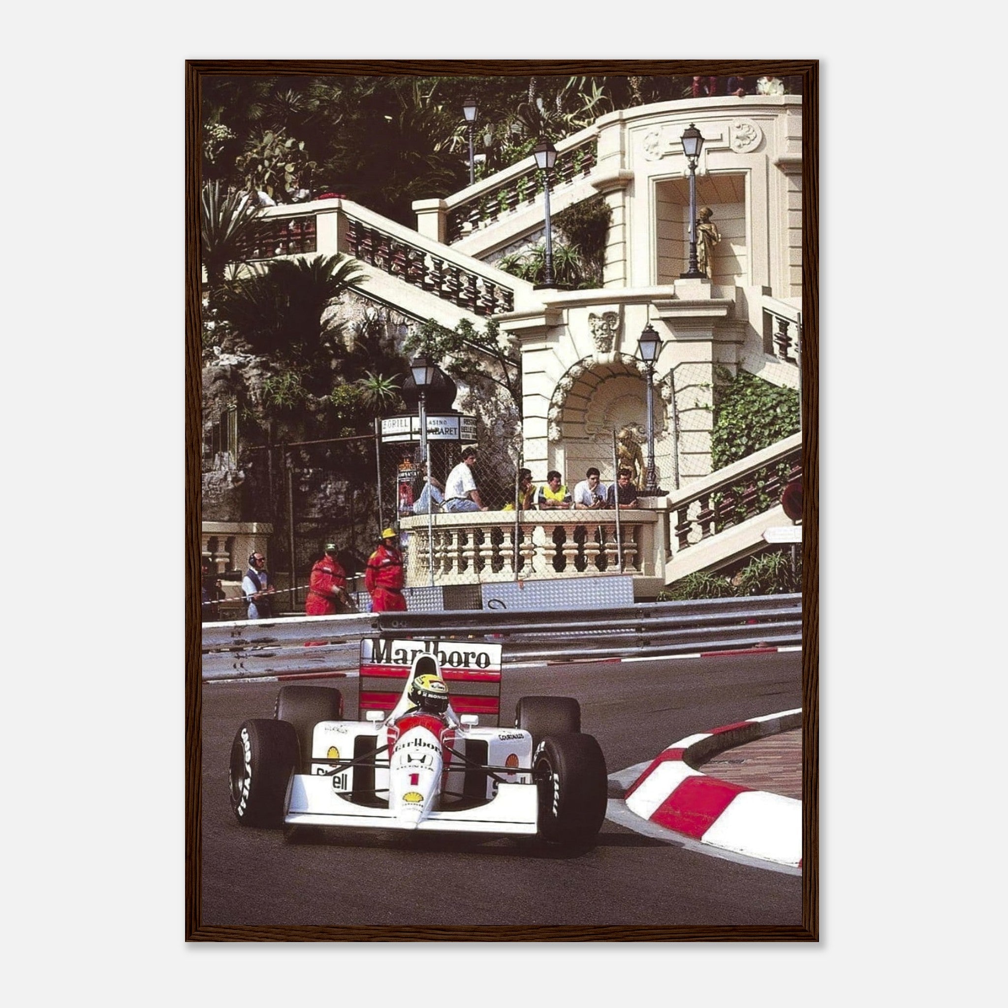 Ayrton Senna driving at Monaco Grand Prix, framed print showcasing vivid colors and iconic racing moment.