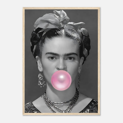 Frida Kahlo framed print featuring black and white image with pink bubble gum for a playful artistic touch.