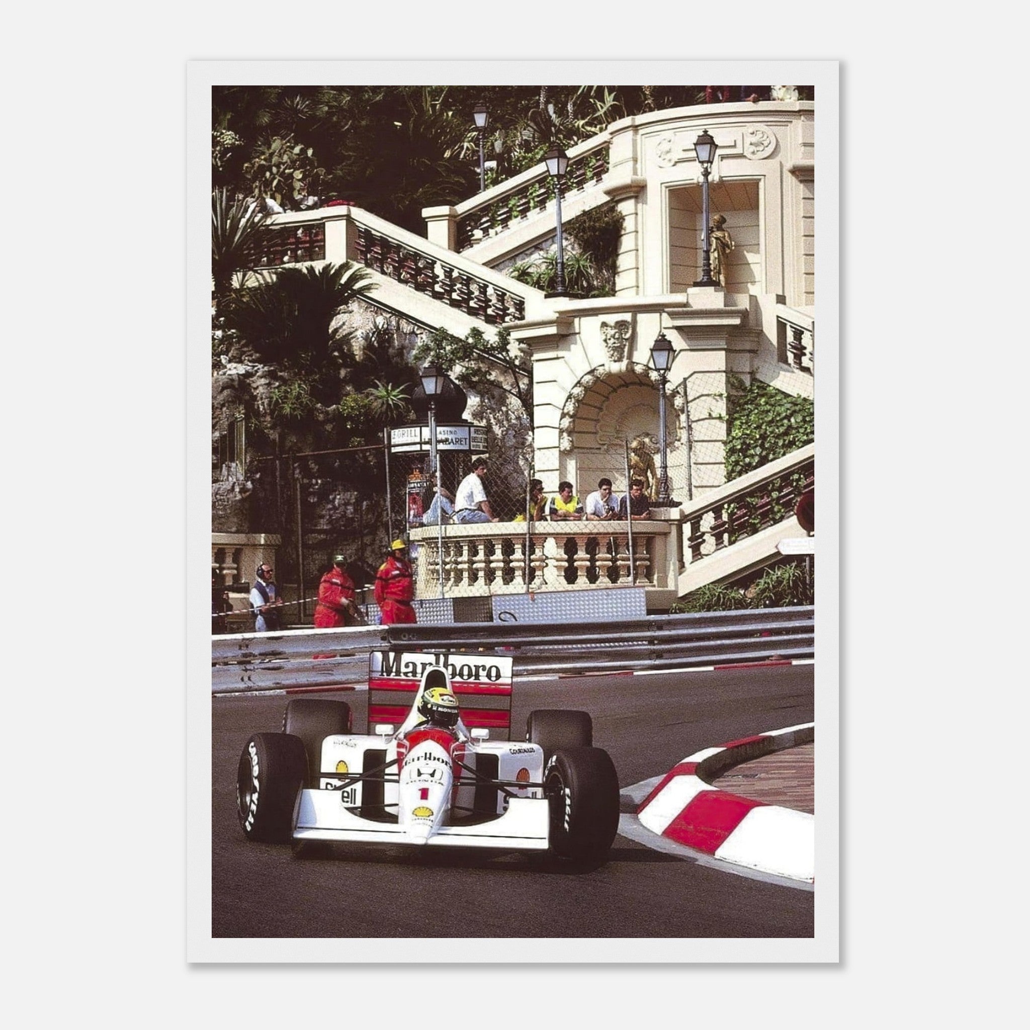 Ayrton Senna racing at the Monaco Grand Prix in a classic McLaren car, framed print showcasing iconic motorsport history.