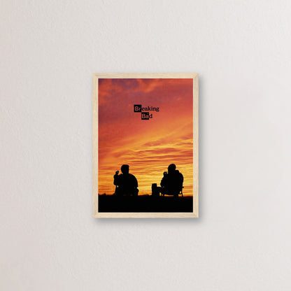 Breaking Bad framed poster featuring Walter White and Jesse Pinkman silhouetted against a vibrant sunset backdrop.