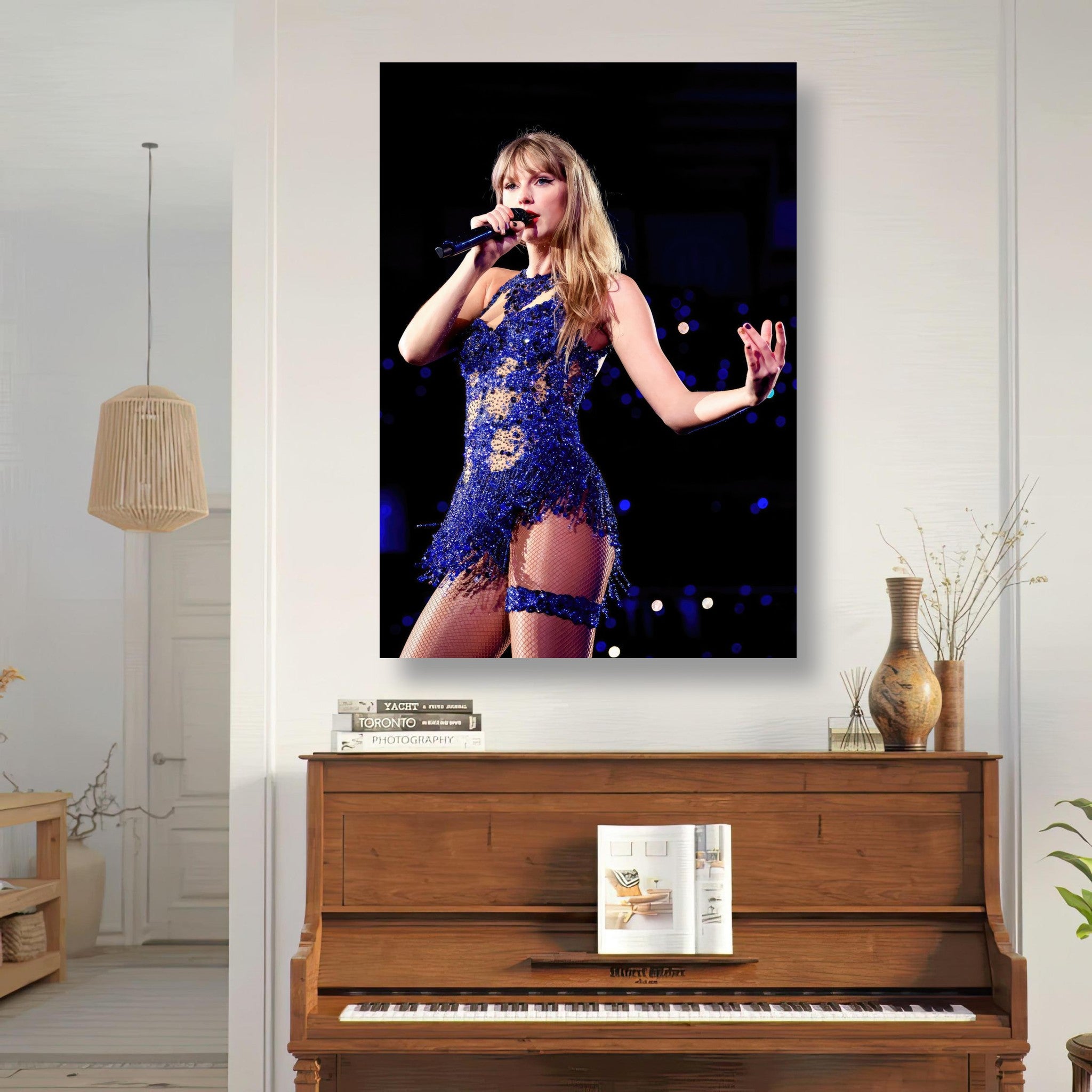 Taylor Swift performing in a dazzling blue outfit, captured in a stunning photo poster for fans of live music.