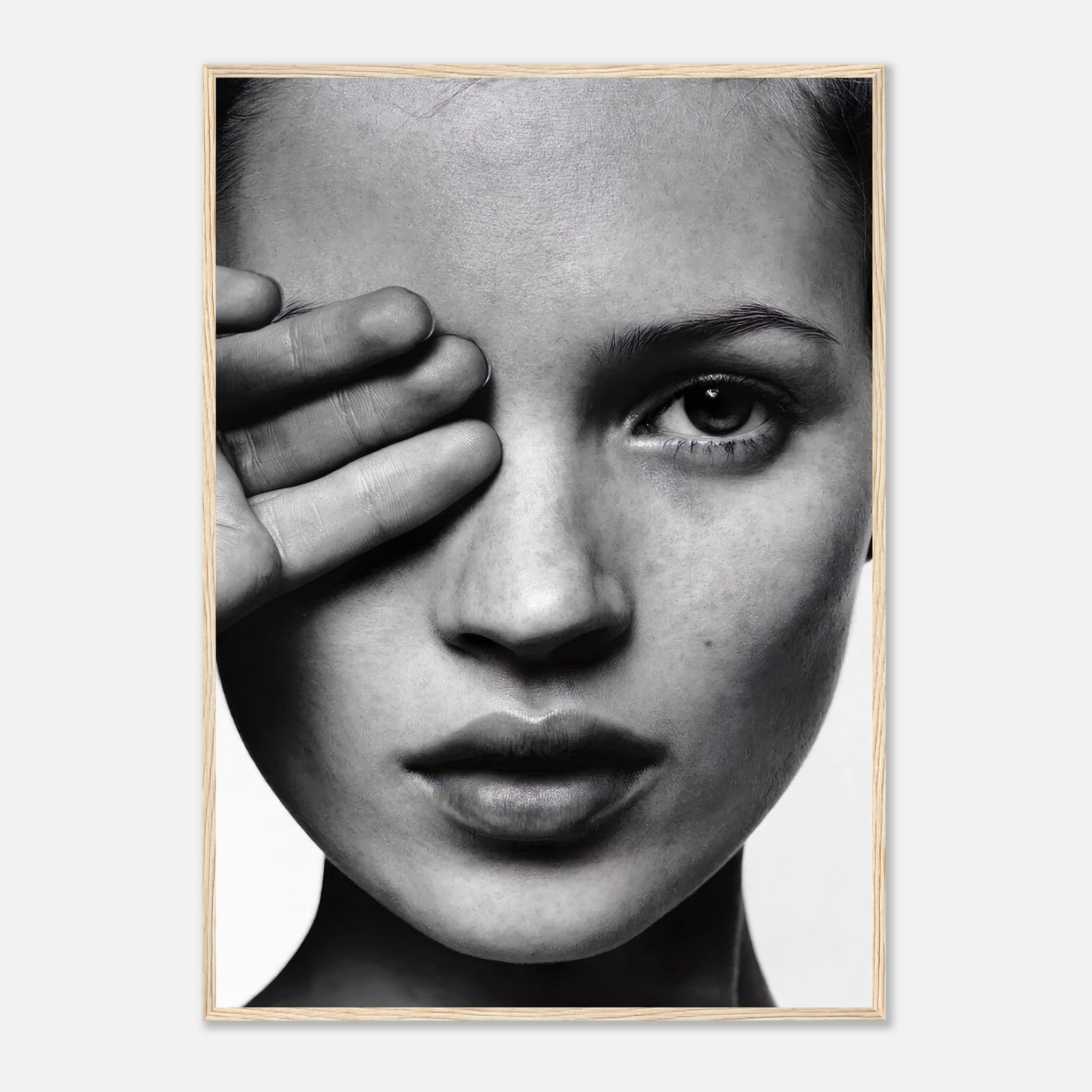 Kate Moss striking black and white portrait in a framed print, showcasing modern elegance and sophistication.