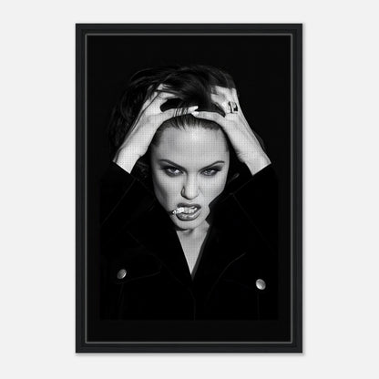 Angelina Jolie Smoking Framed Canvas Print showcasing elegance and rebellion in black and white artwork. Perfect for home decor.