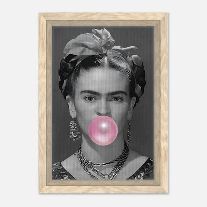 Frida Kahlo framed canvas print featuring a grayscale portrait with pink bubble gum bubble. Vintage yet playful design.