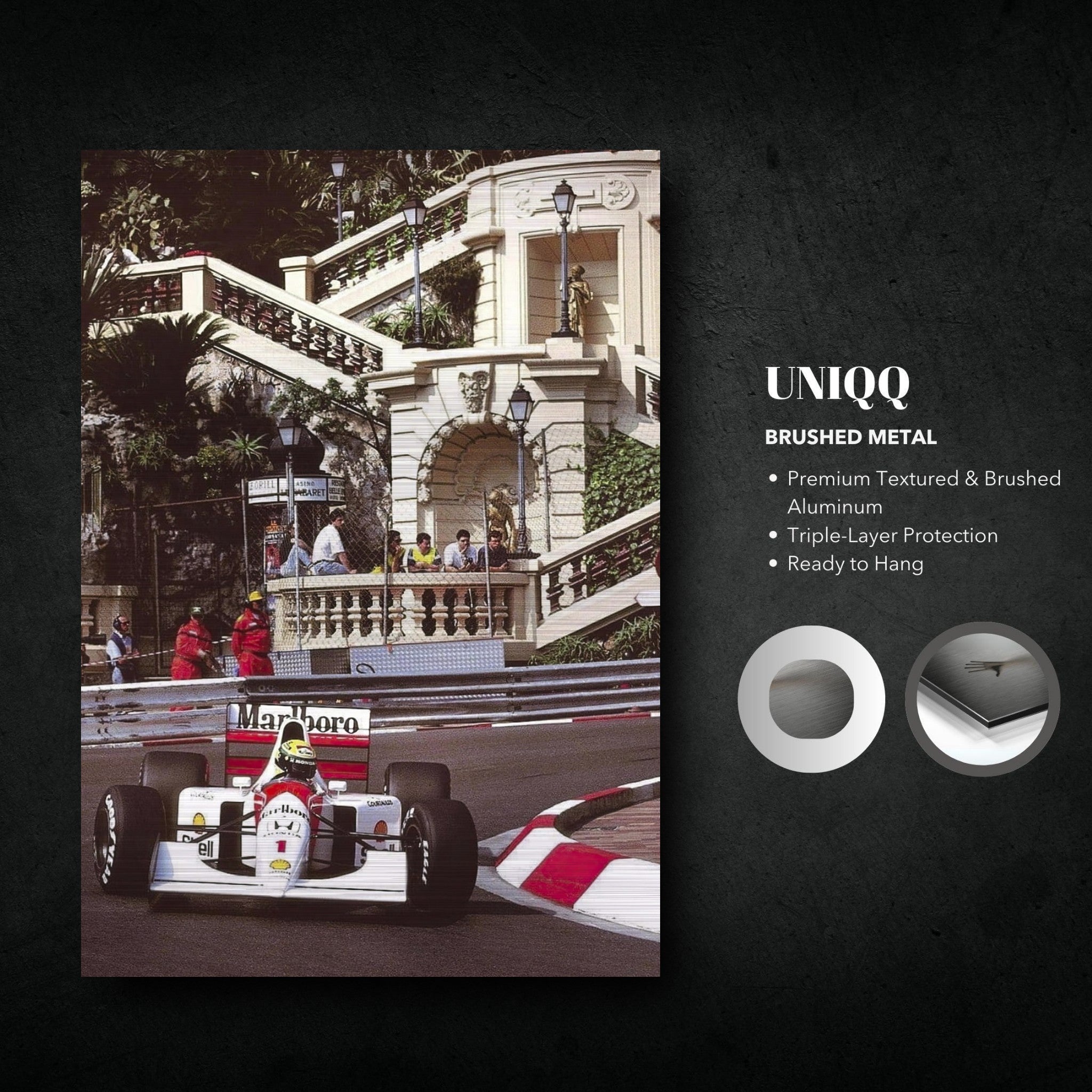 Ayrton Senna's iconic Monaco race captured on brushed metal, featuring textured aluminum for a striking visual impact.