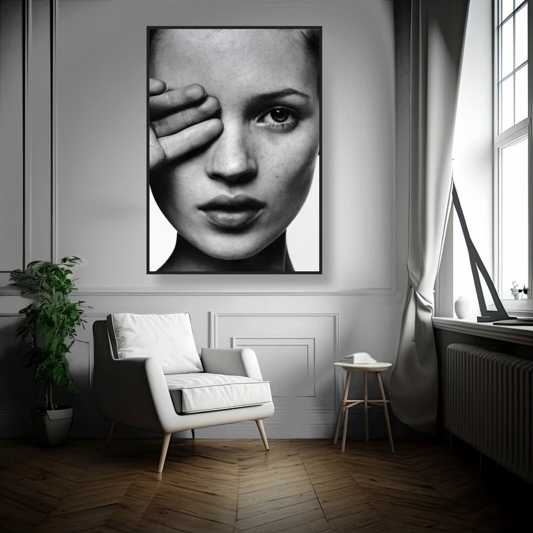 Kate Moss black and white framed print showcasing striking portrait in a modern living room setting.