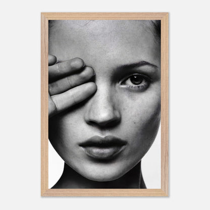 Kate Moss black and white photography vintage framed print featuring a close-up of her face and hand covering one eye.