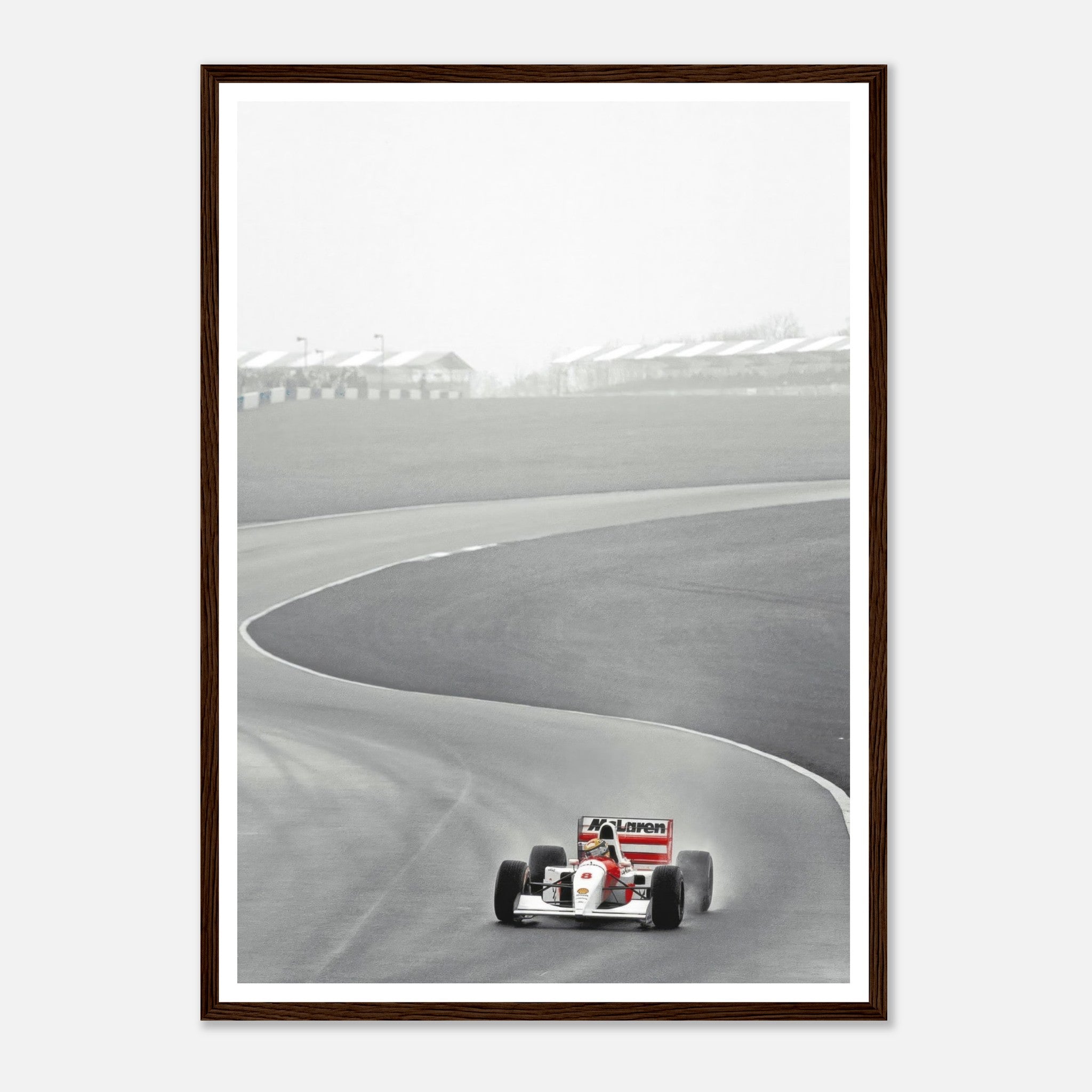 1988 Ayrton Senna McLaren MP4/4 racing on track, black and white framed print showcasing motorsport history.