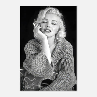 Marilyn Monroe smoking, dressed in a cozy sweater, capturing timeless Hollywood glamour in black and white metal print.