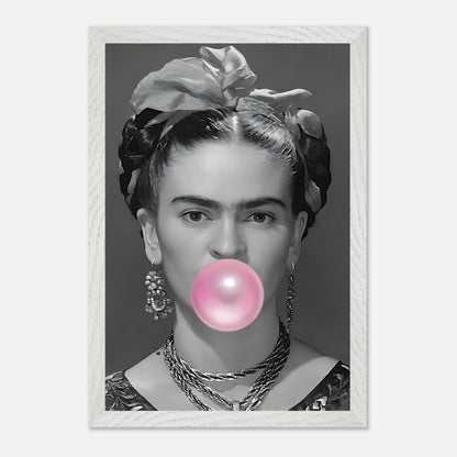 Frida Kahlo blowing a pink bubble gum in vintage black-and-white framed art, showcasing bold creativity and modern decor.