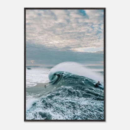 Big wave surfing fine art print showcasing a surfer riding a colossal wave against a moody sky.