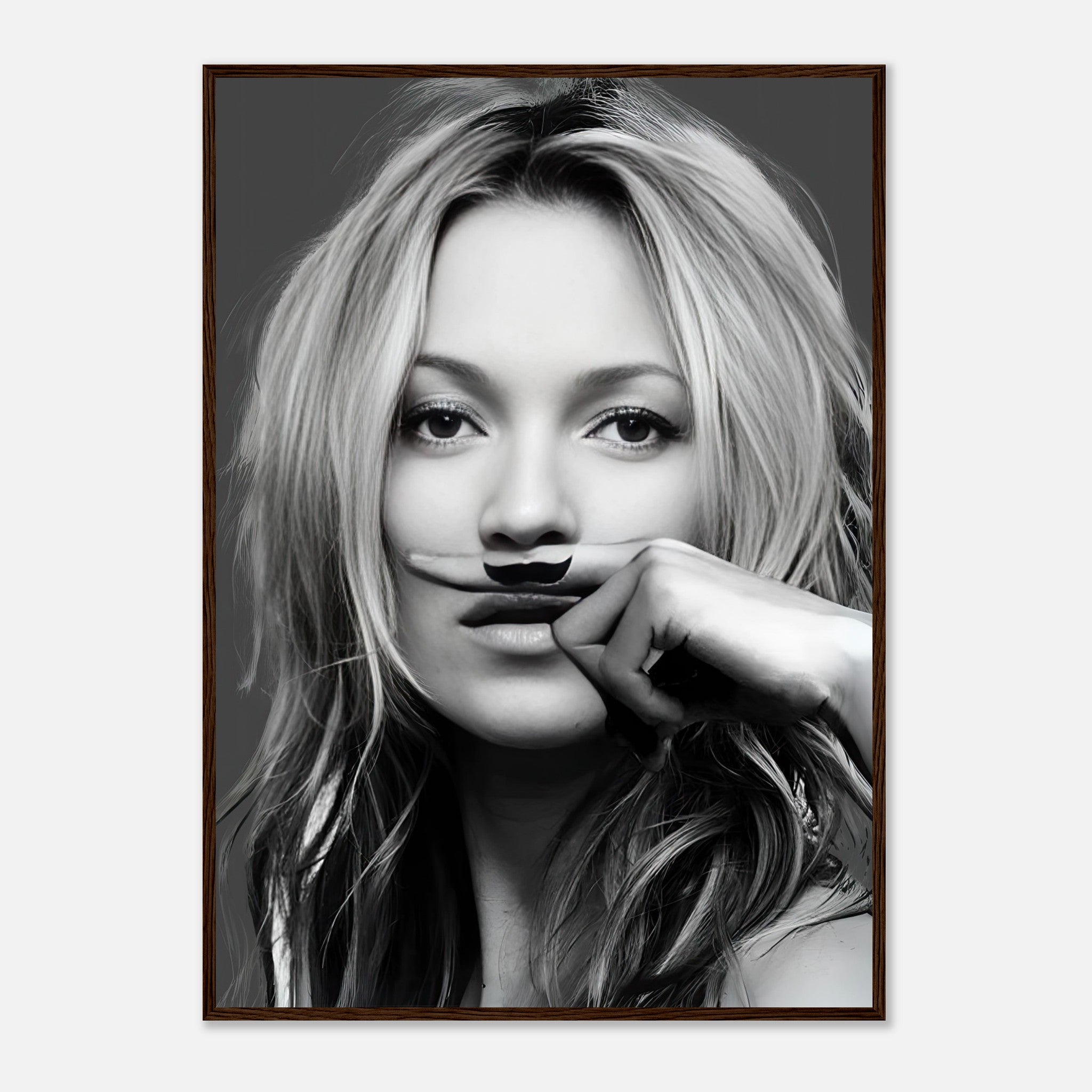 Kate Moss Mustache Framed Print featuring a stylish black-and-white portrait with a whimsical mustache design.