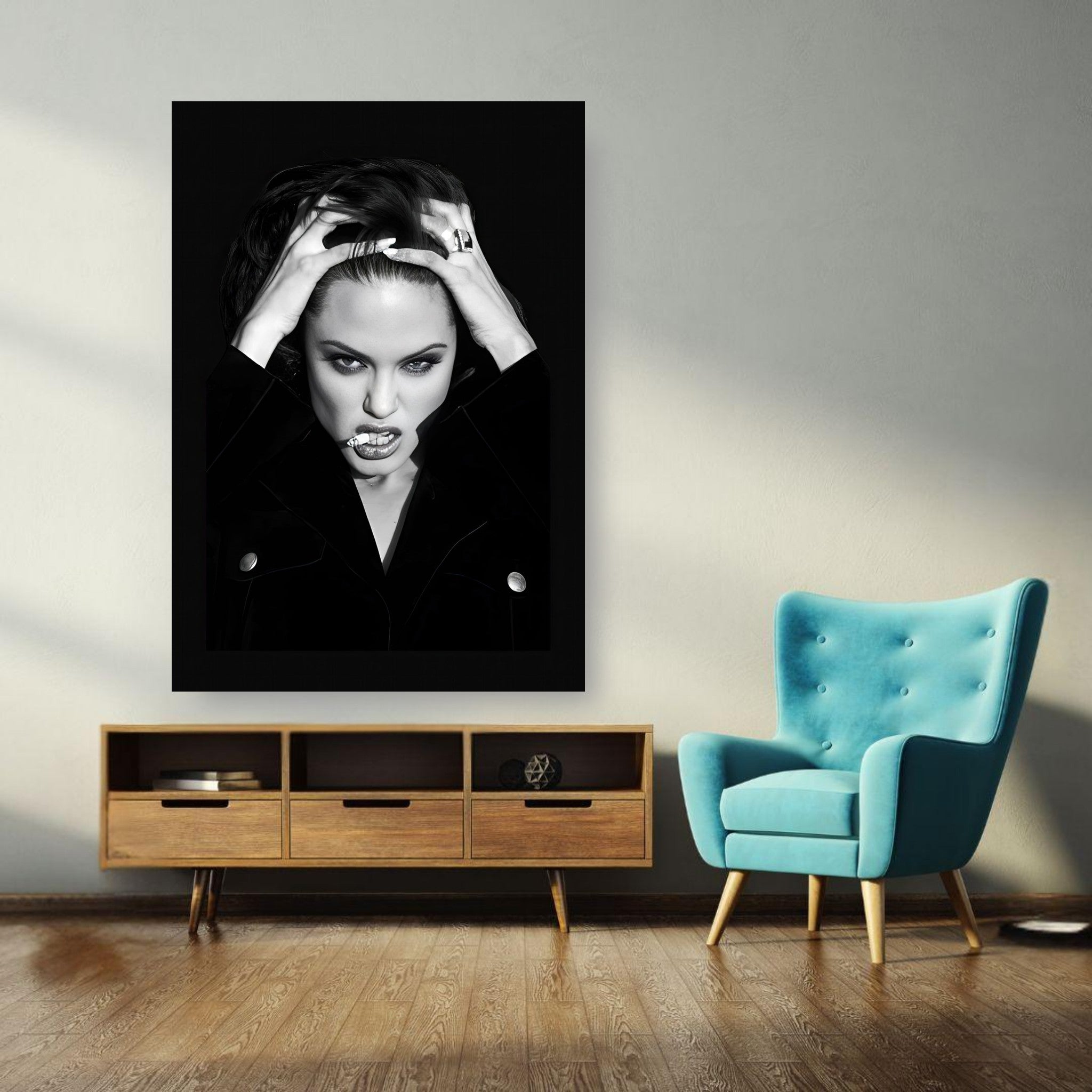 Angelina Jolie Smoking poster displayed in a modern living room with a stylish teal chair and wooden furniture.