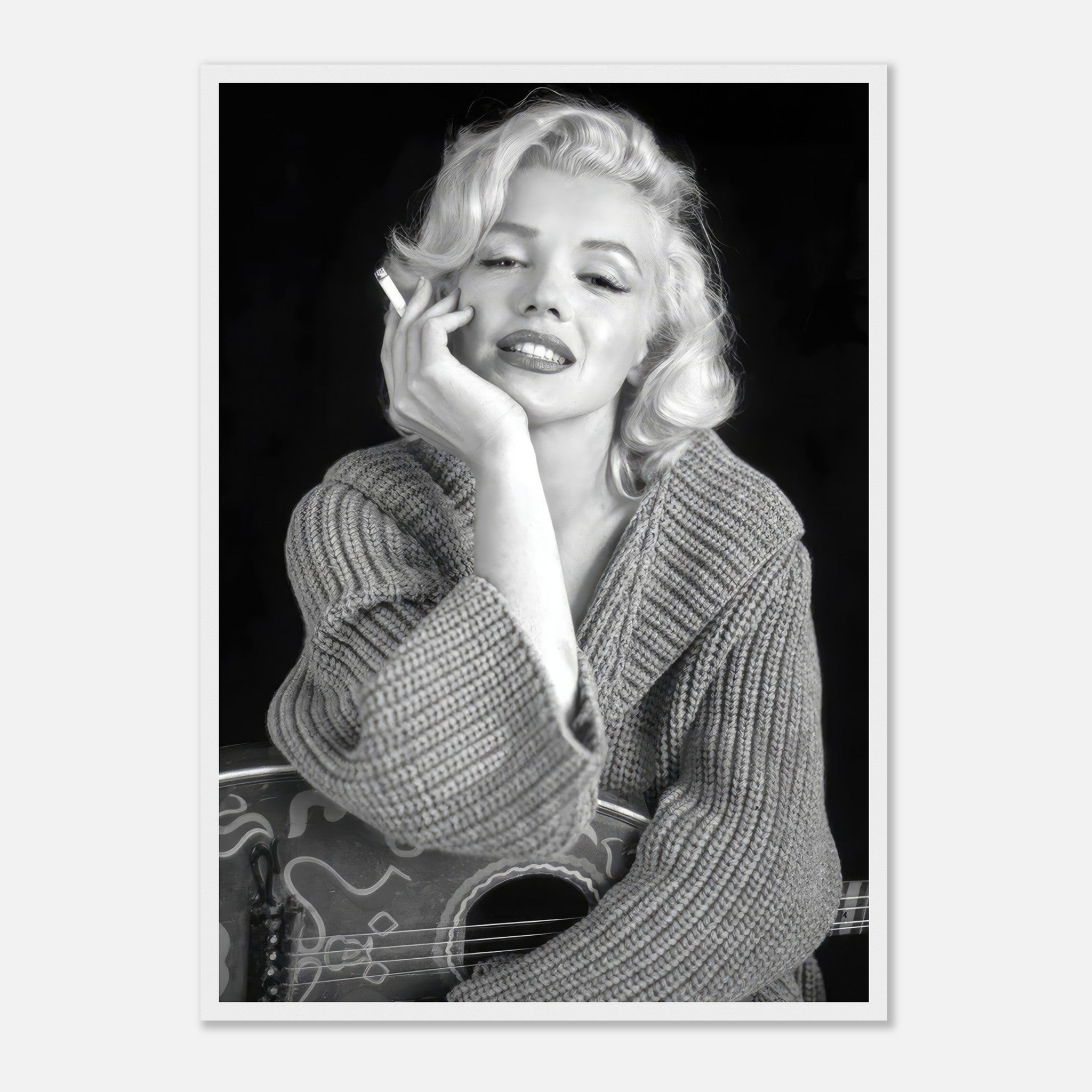 Marilyn Monroe smoking in a cozy sweater, capturing timeless elegance in a stunning black-and-white framed poster.