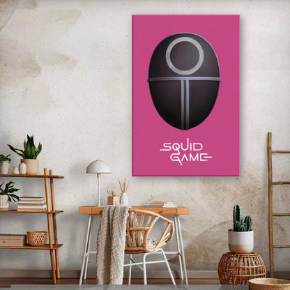 Squid Game Guard Mask canvas print displayed in a modern room with a pink background and minimalist decor.