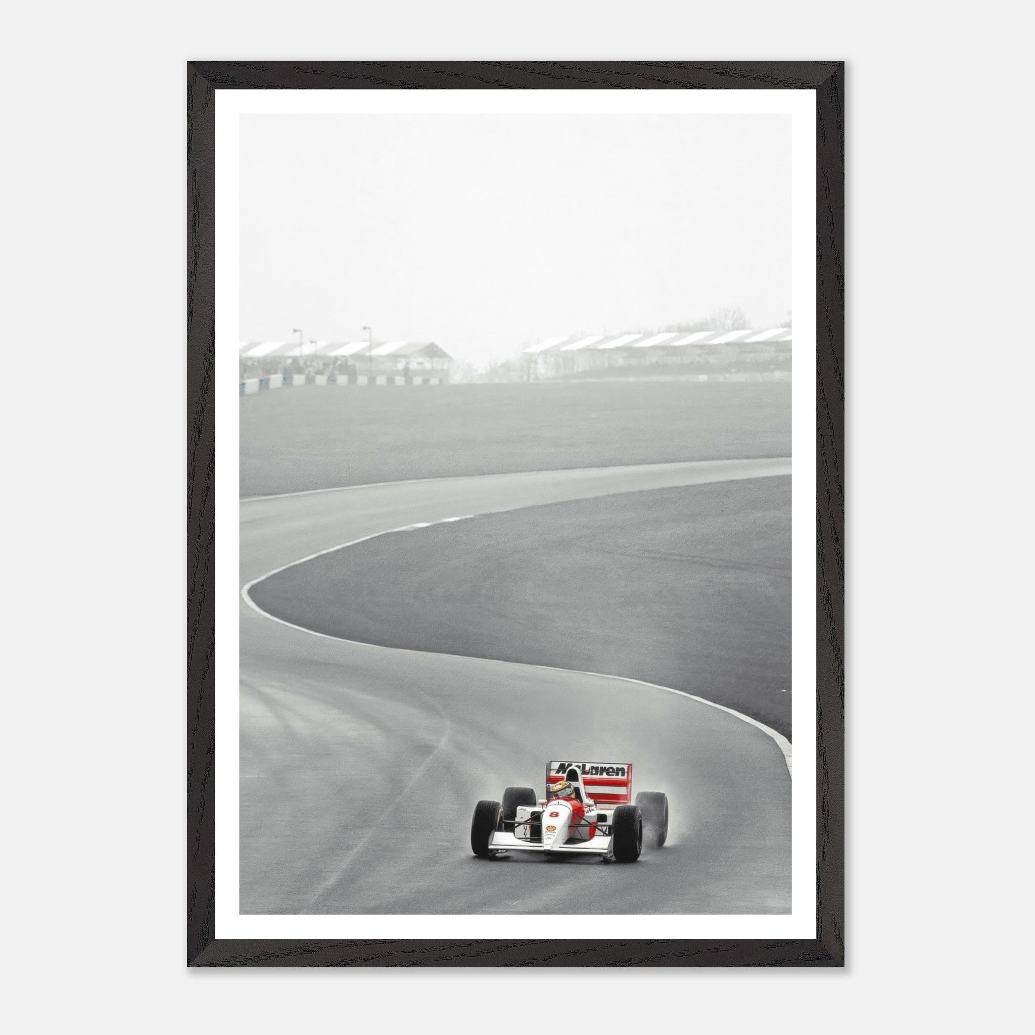 1988 Ayrton Senna McLaren MP4/4 racing photograph framed in fine art style, capturing speed and precision on a track.