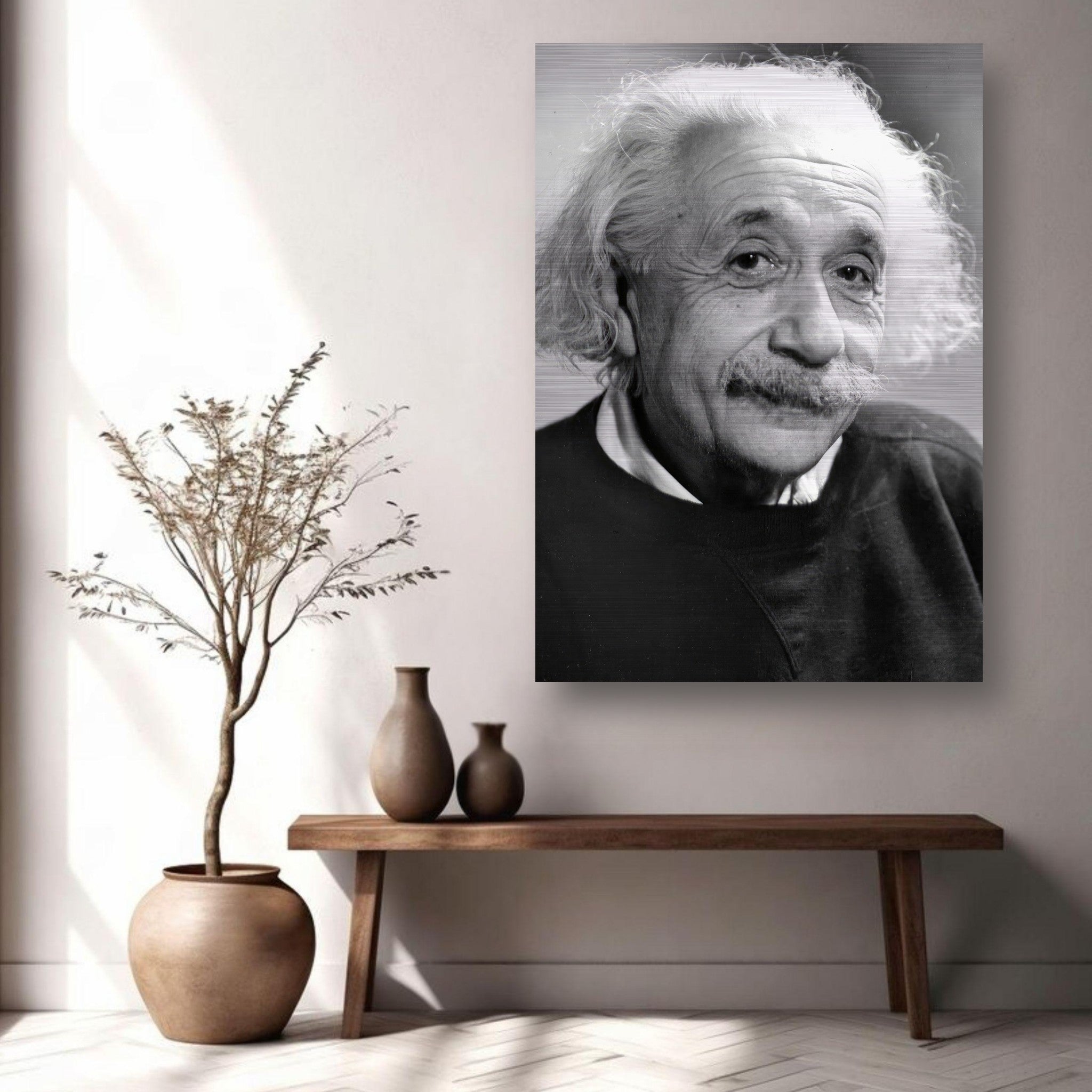 Brushed metal print of Albert Einstein (1946) displayed in a modern living space, emphasizing wisdom and artistry.