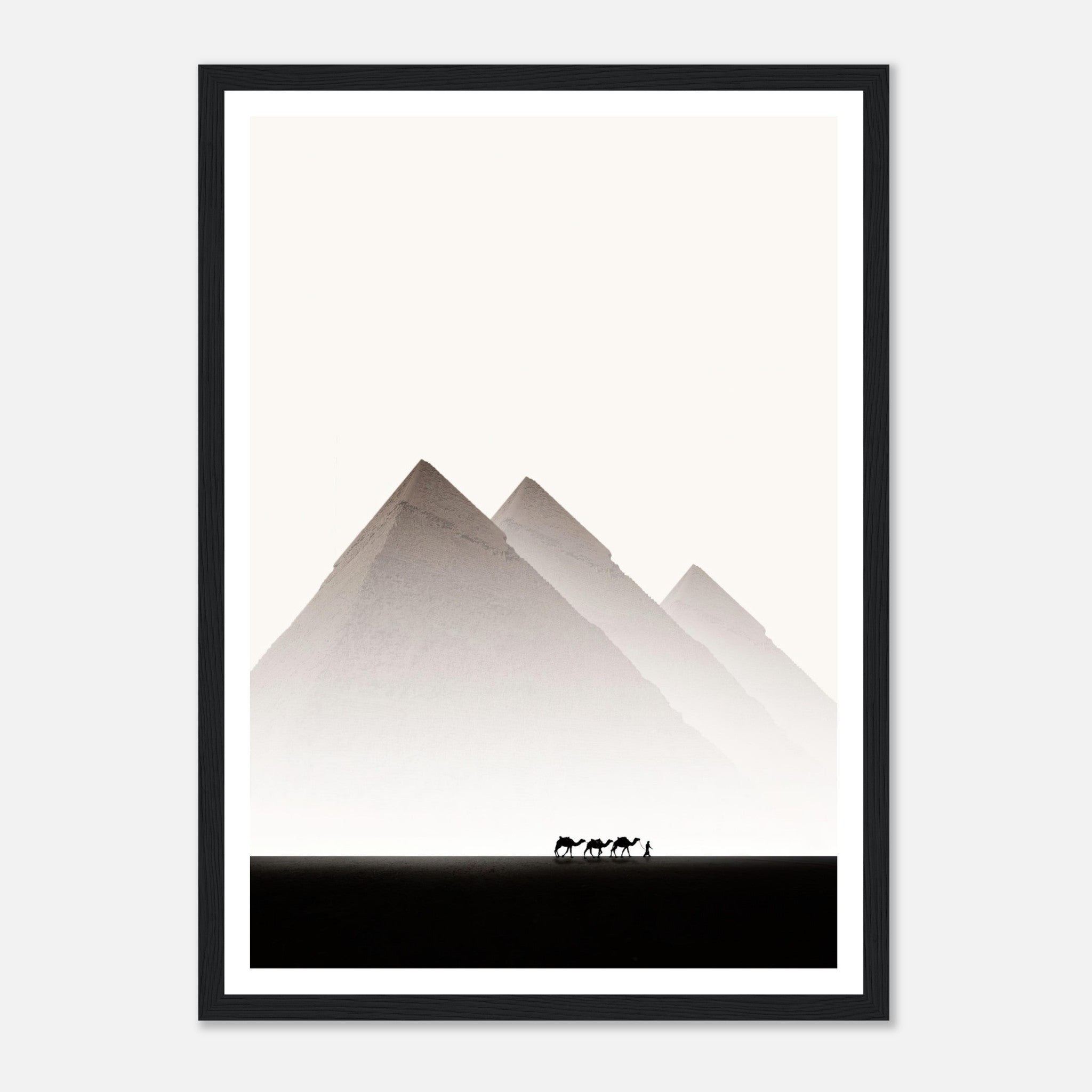 Framed print of the Pyramids of Giza with silhouettes of camels against a minimalist desert backdrop.