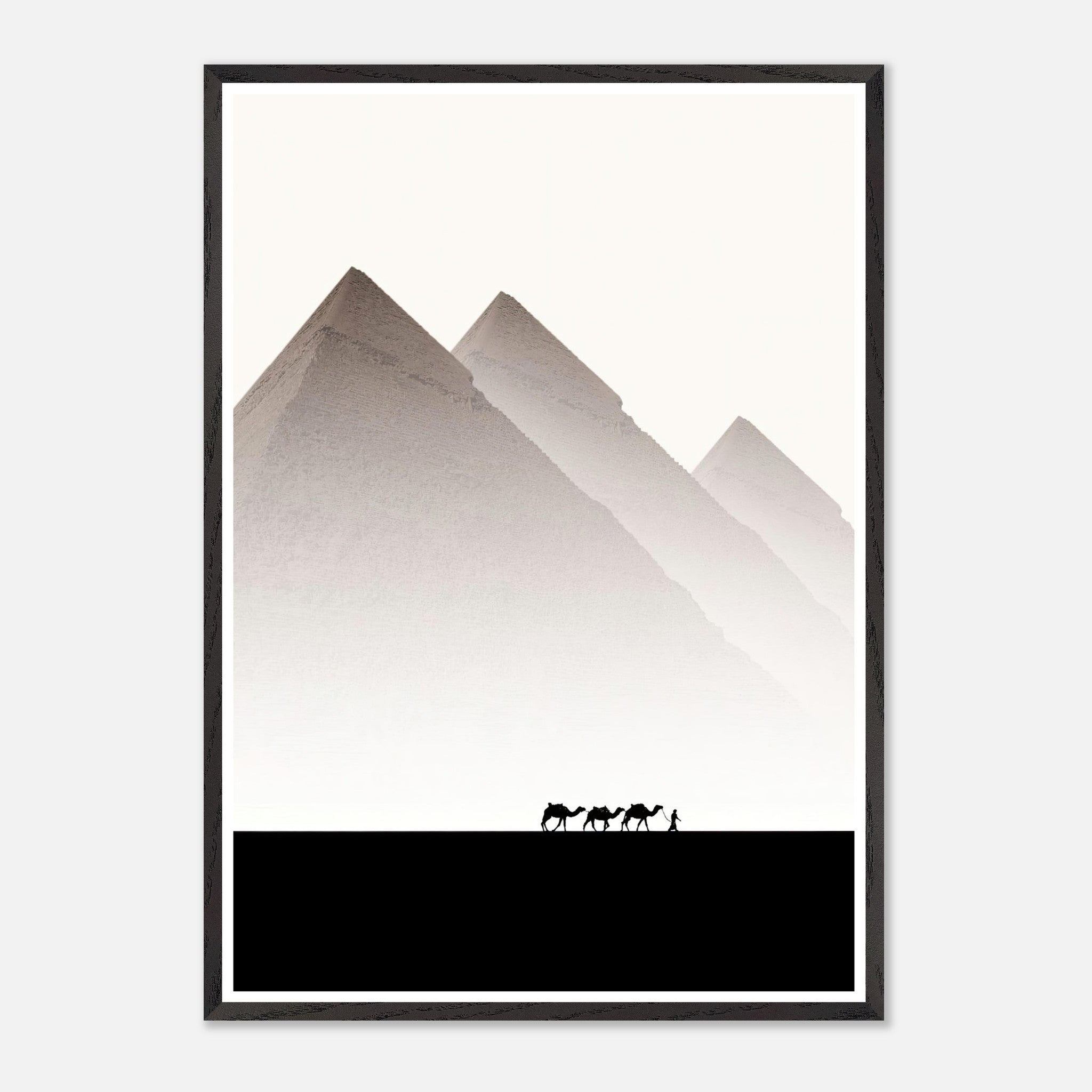 Framed art print of the Pyramids of Giza with camels and guide against a soft sky, capturing ancient Egypt's beauty.