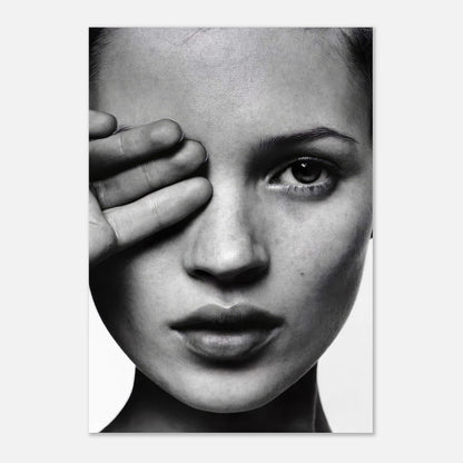 Kate Moss black and white photography metal print portraying elegance and beauty through a striking facial expression.