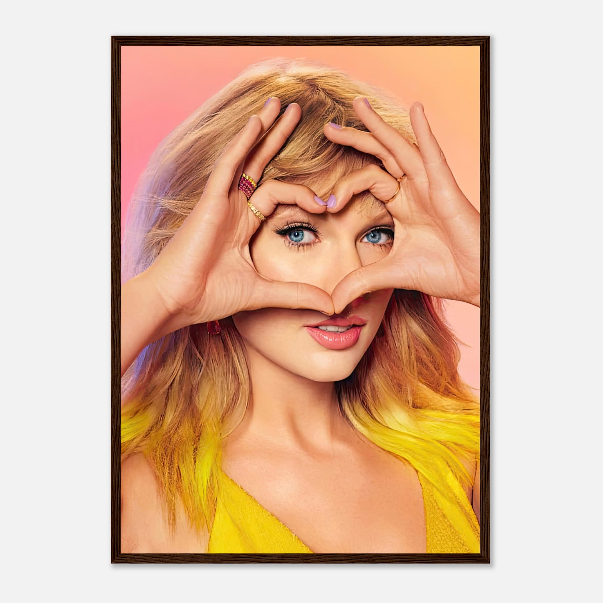 Taylor Swift framed print showing her making a heart shape with hands, featuring vibrant colors and captivating details.