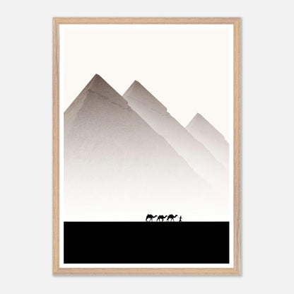 Framed art of the Pyramids of Giza with camels in silhouette against a soft sky, showcasing travel photography elegance.