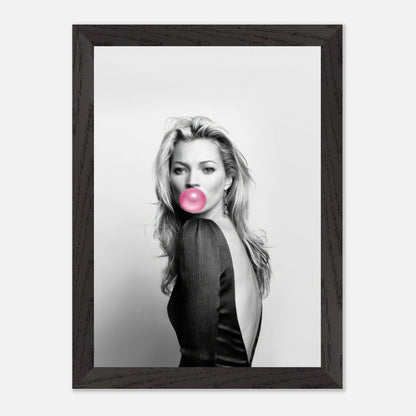 Kate Moss Bubble Gum vintage framed print featuring a black-and-white portrait with pink bubble gum, enhancing home decor.