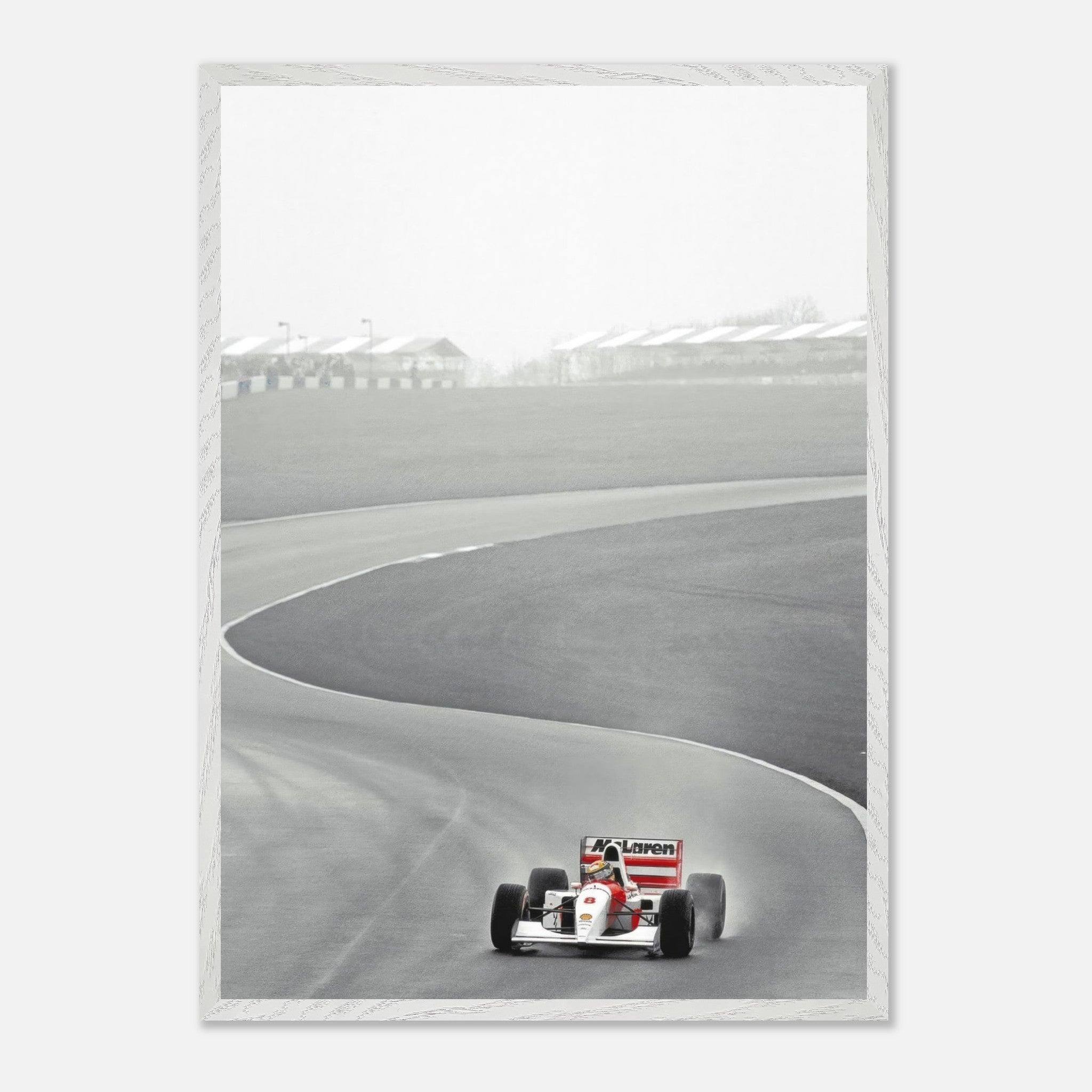 Framed Giclée print of Ayrton Senna driving the McLaren MP4/4 during a Formula 1 race in 1988.