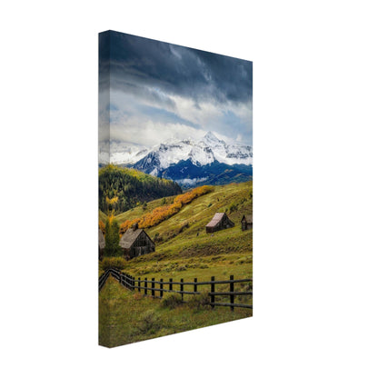 Telluride, Colorado canvas featuring rustic cabins and snow-capped peaks surrounded by vibrant autumn colors.