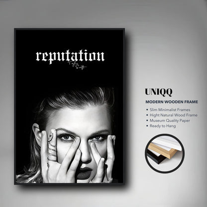 Framed Taylor Swift Reputation poster in minimalist frame, featuring black-and-white image and bold text.