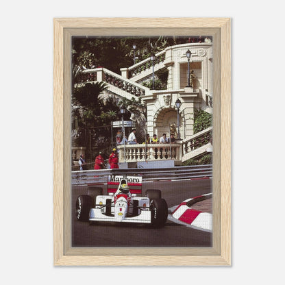 Ayrton Senna racing in Monaco framed canvas print, showcasing vibrant colors and detail in a sleek frame.