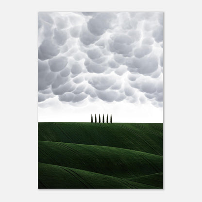 Stunning Tuscan landscape poster showcasing rolling green hills and iconic cypress trees under dramatic clouds.