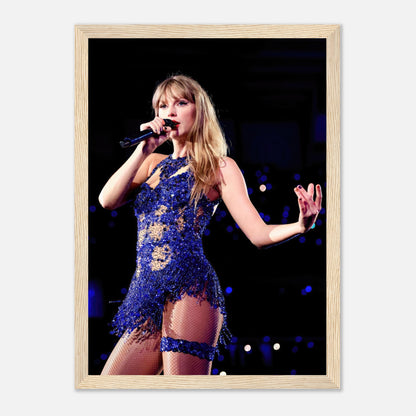 Taylor Swift framed print in a blue outfit, performing on stage with a microphone, vibrant colors and captivating energy.