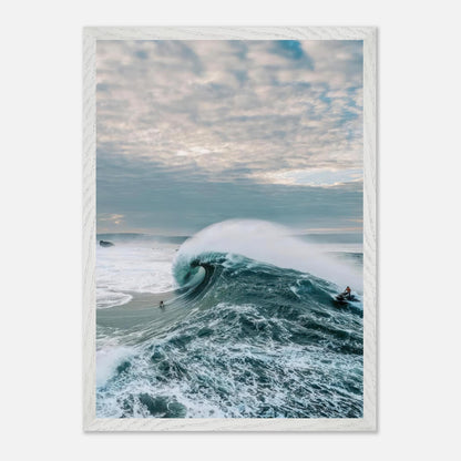 Breathtaking fine art print of big wave surfing with a surfer riding a colossal wave under a moody sky.